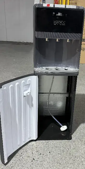 Concealed bottle cabinet behind front door